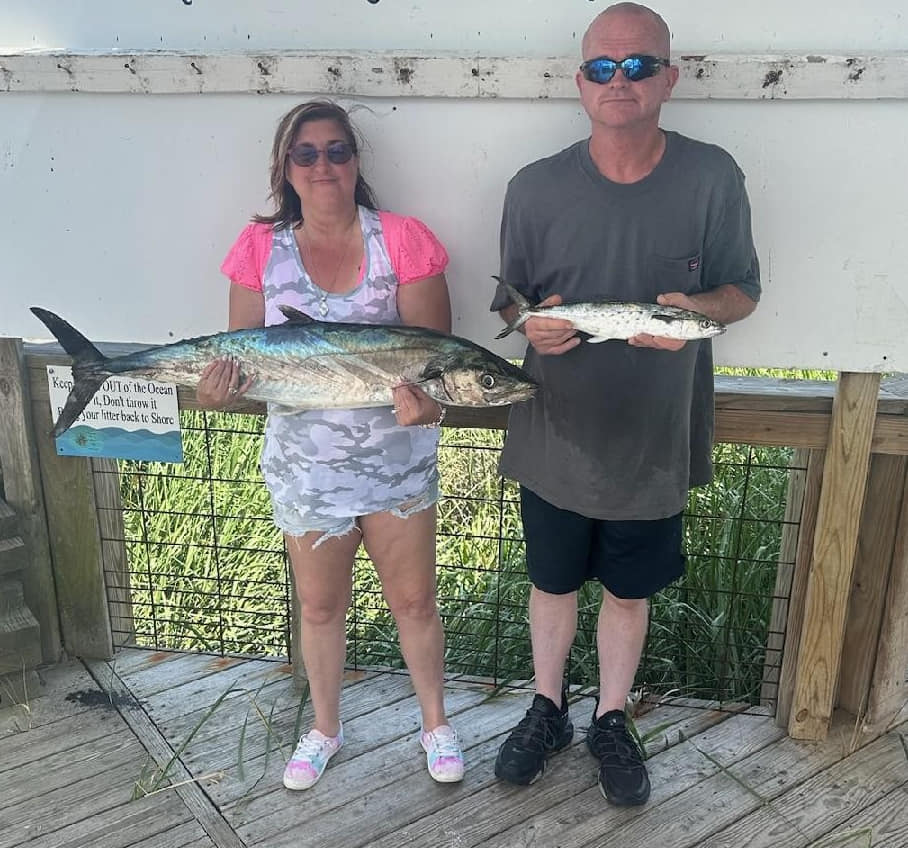 Two Spanish Mackerel, each about 30 inches long, caught while fishing at Midway