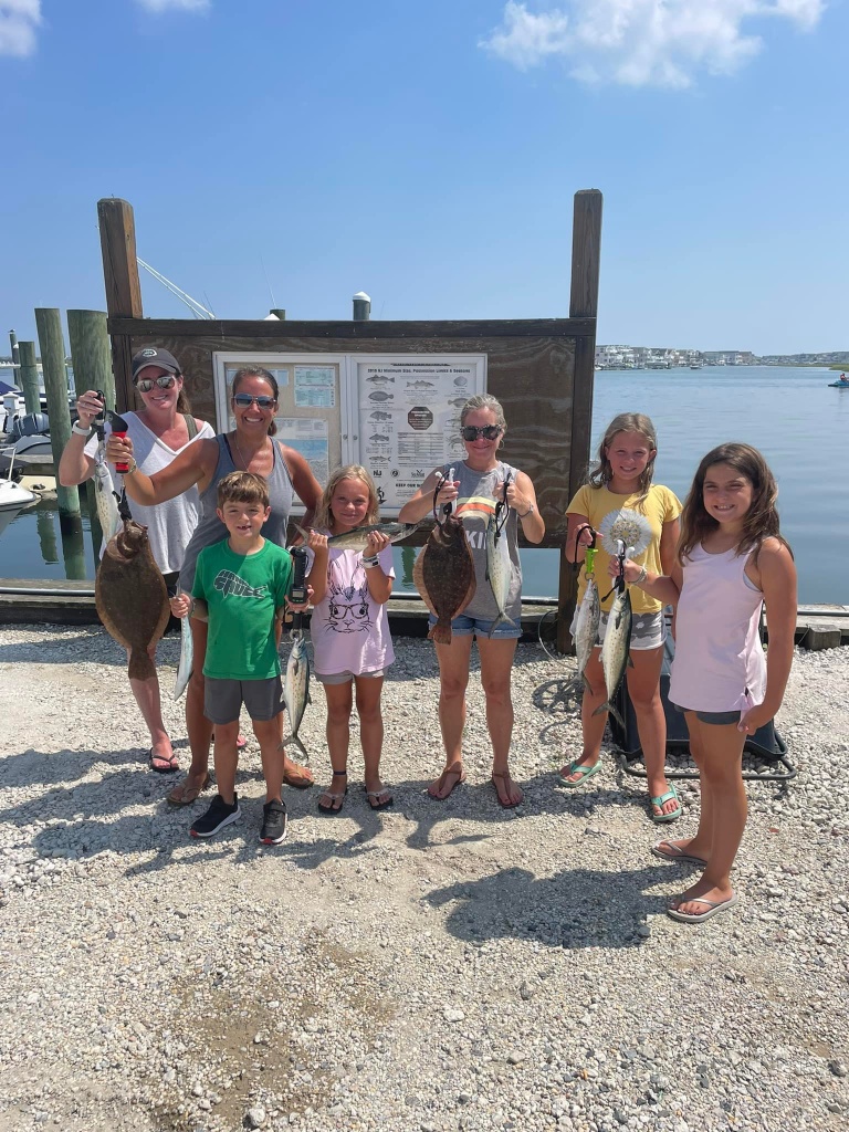 2 people fishing with rods in New Jersey