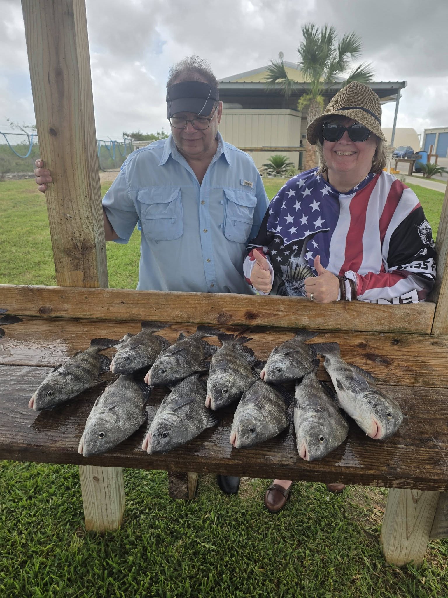 Black drum fishing catch displayed on wooden table in Texas City TX