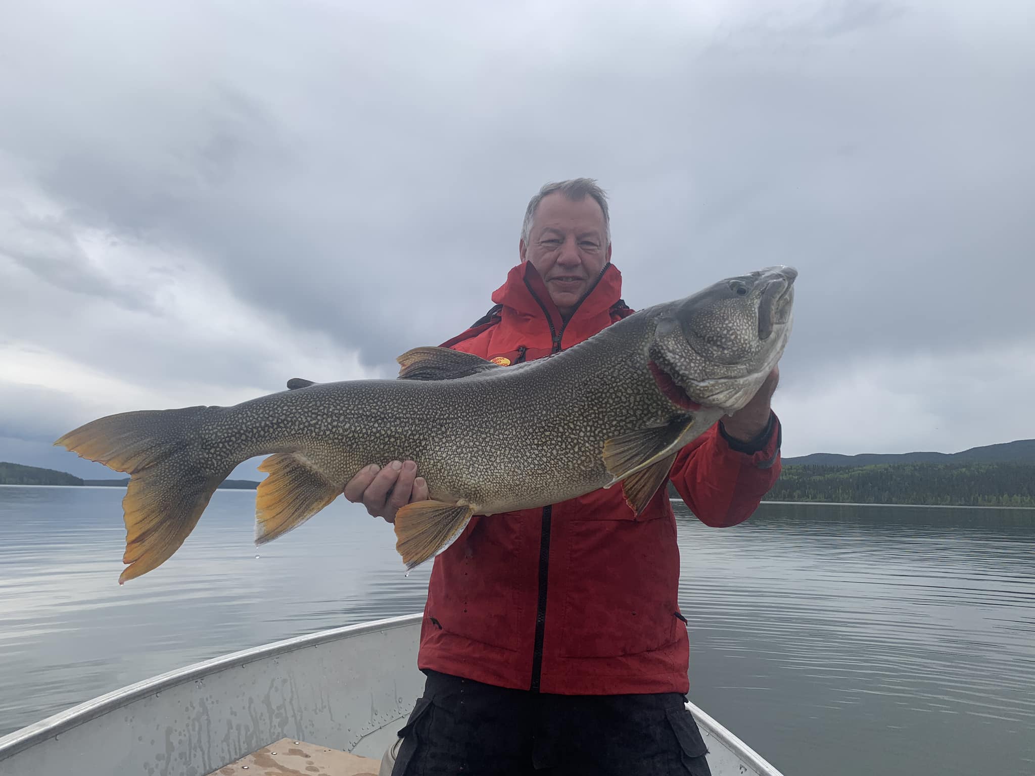 Angler with a big fish in YT