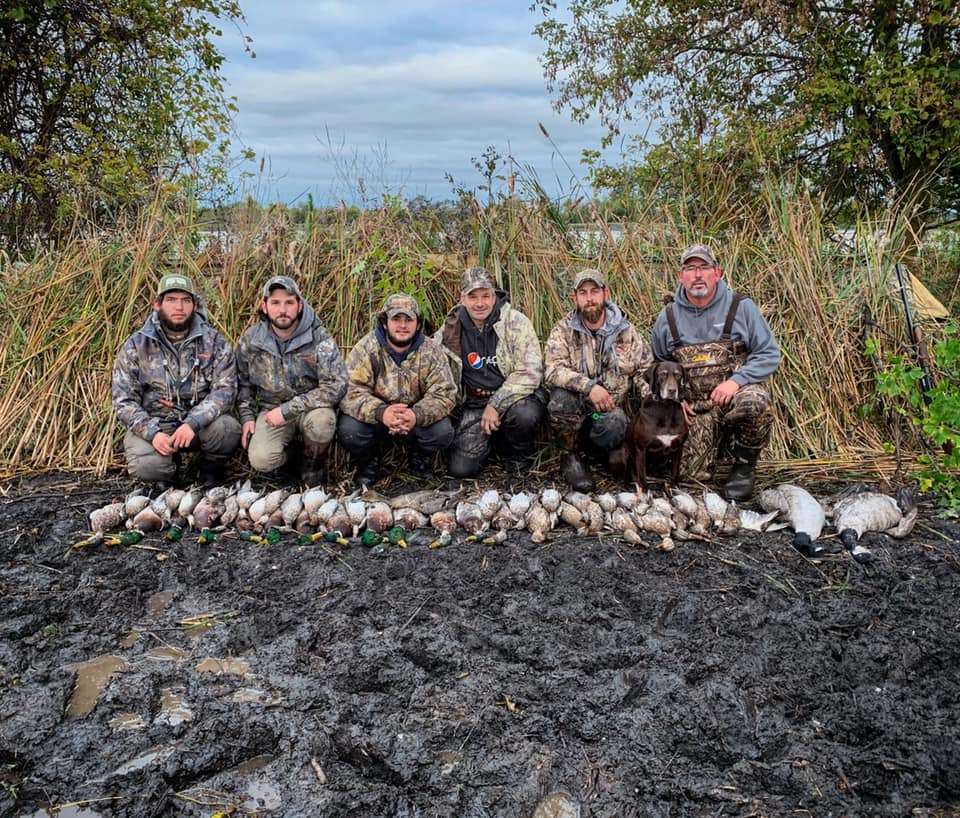A group of 6 people fishing in Traverse City
