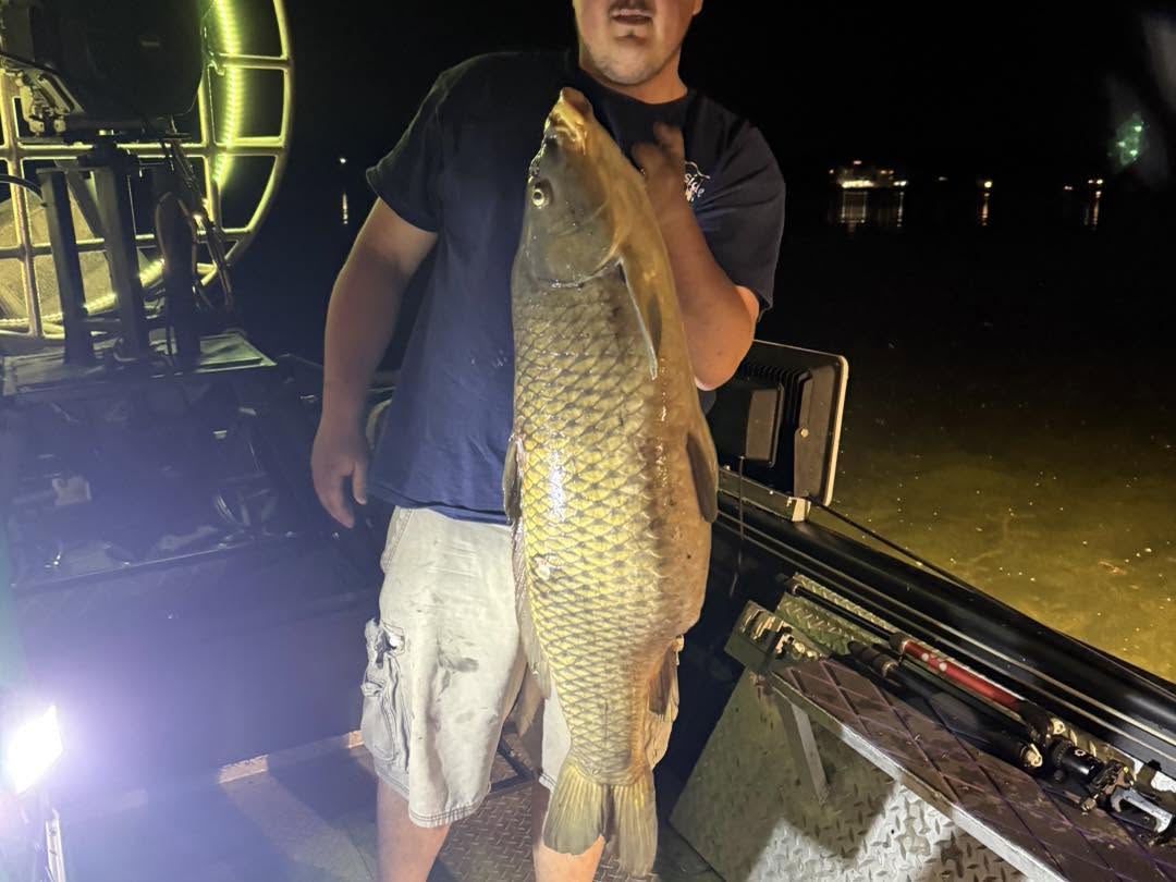 Large common carp caught fishing in Delavan Wisconsin at night