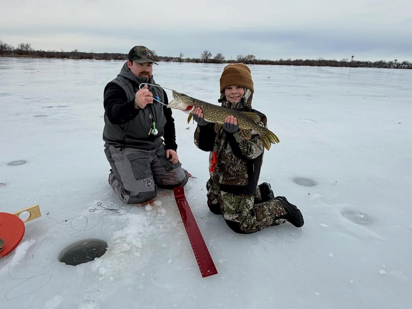 12 hour ice fishing trip on Southern Wisconsin lakes targeting perch, walleye, and northern pike