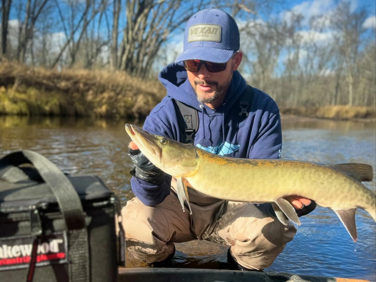 Bowfishing trip on 20-foot pusher boat in Southern Wisconsin waters targeting carp at night