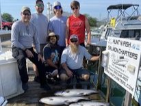 Four anglers fishing in Port Washington