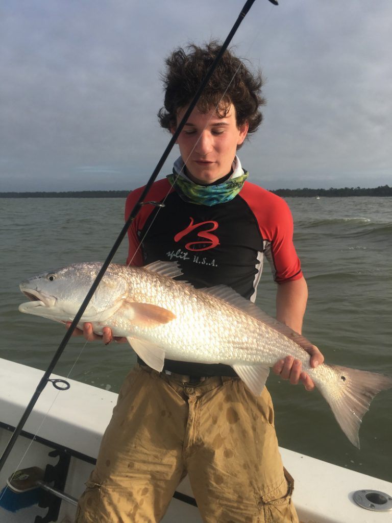 A person fishing in Apalachicola