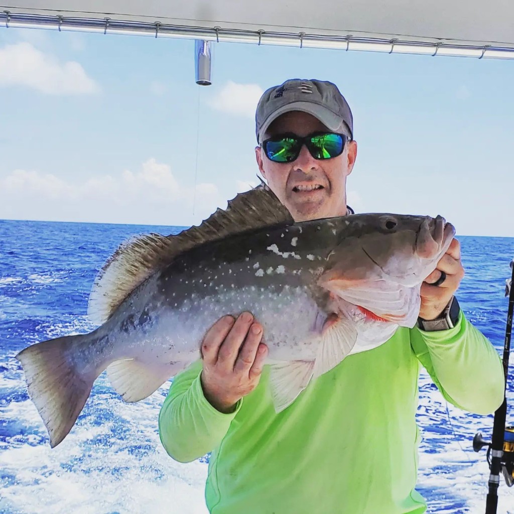 Photograph of a red grouper fish caught in Englewood, Florida