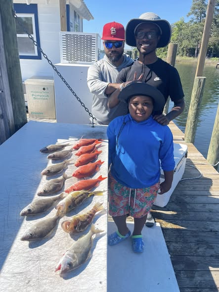 Fresh caught fish displayed on boat deck in Niceville FL after successful fishing trip