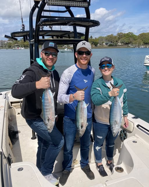Three anglers fishing at Wrightsville Beach