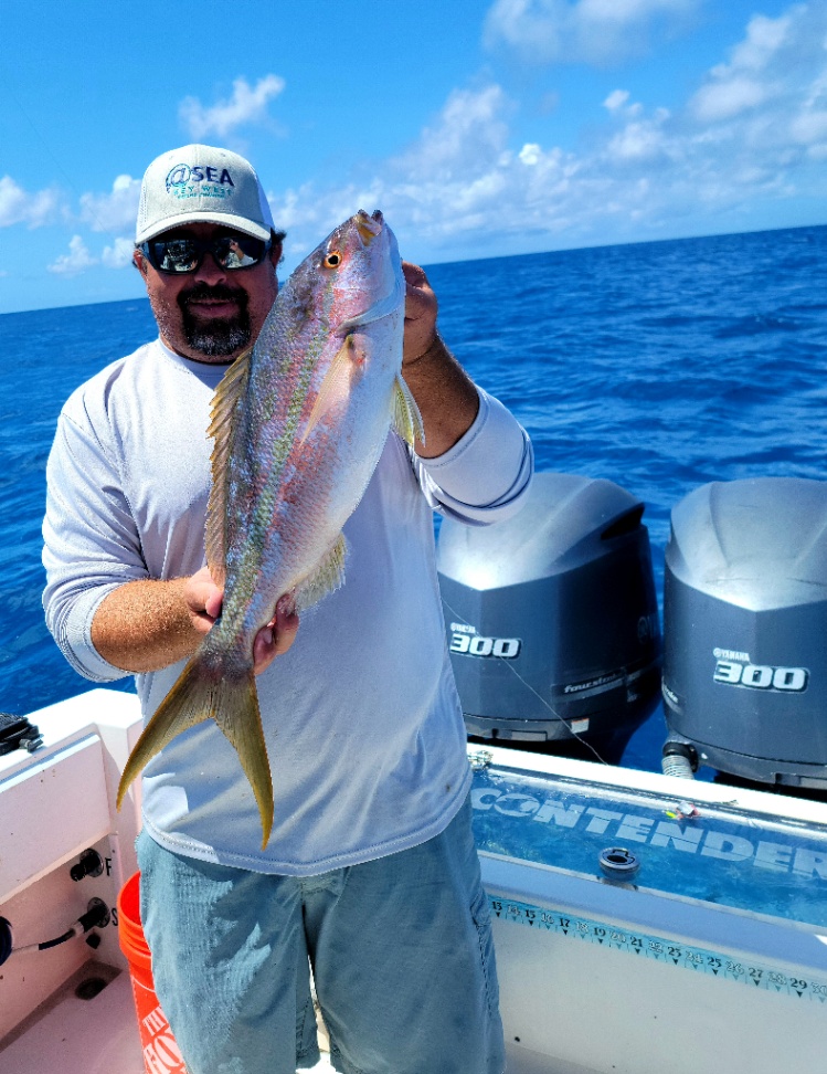Angler with a single caught fish in Key West, Florida