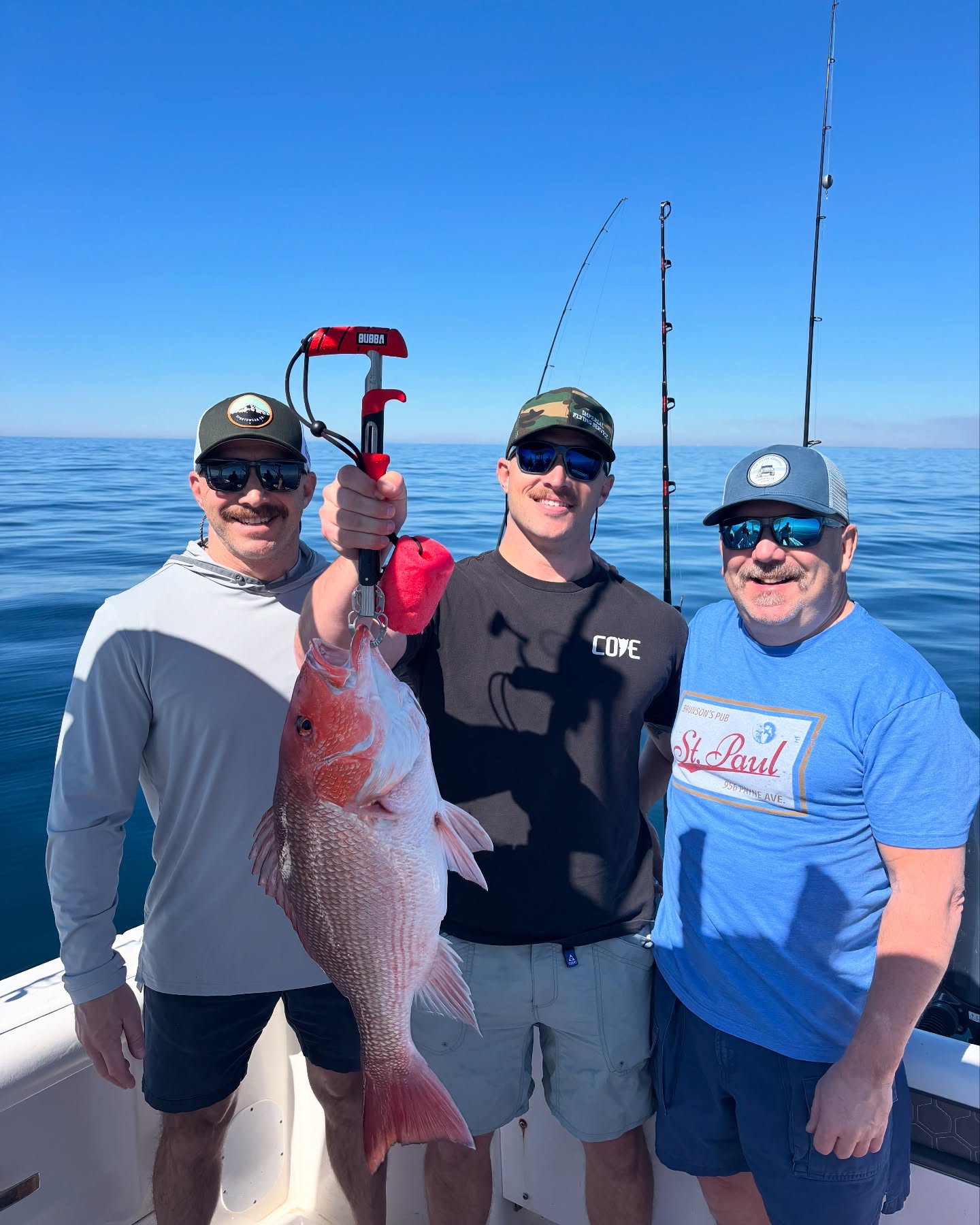 A group of 3 people fishing in Pensacola