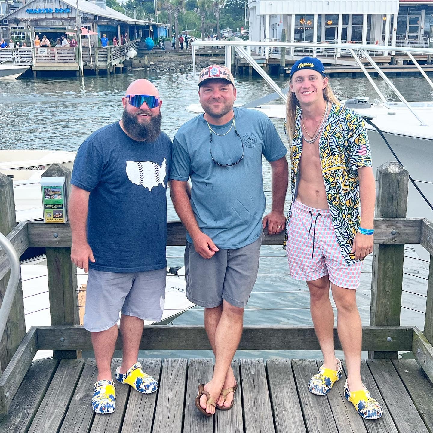 Three people fishing on the coast of South Carolina