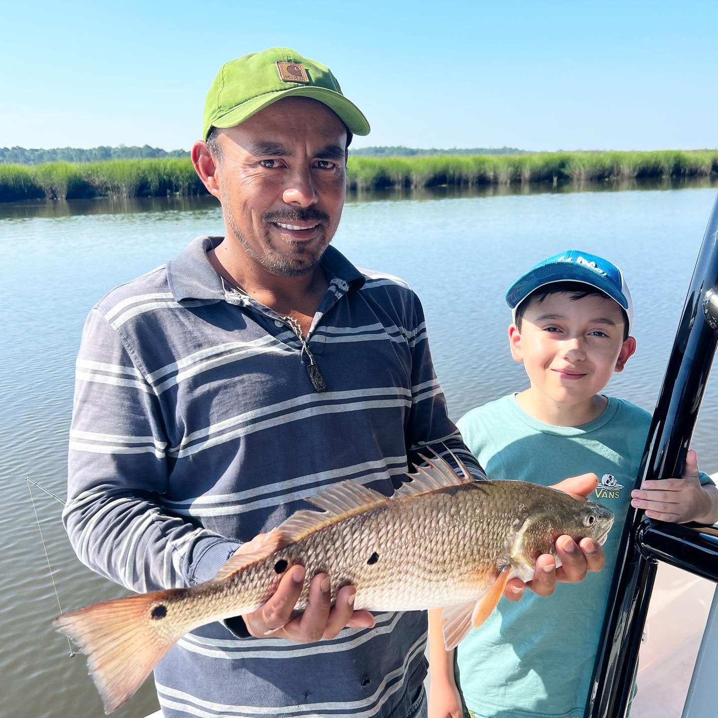 Two people fishing in Hanahan