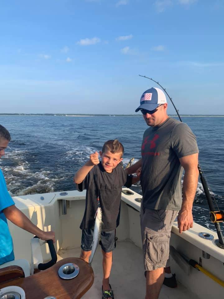 Two people fishing at Carolina Beach