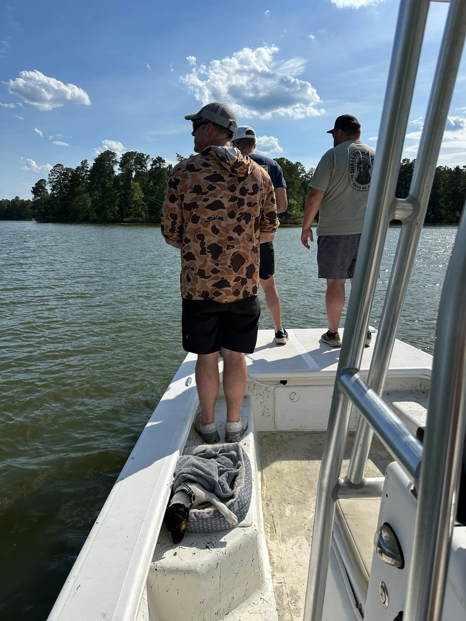 Fishing boat on lake in Moncure NC with anglers preparing for day on water