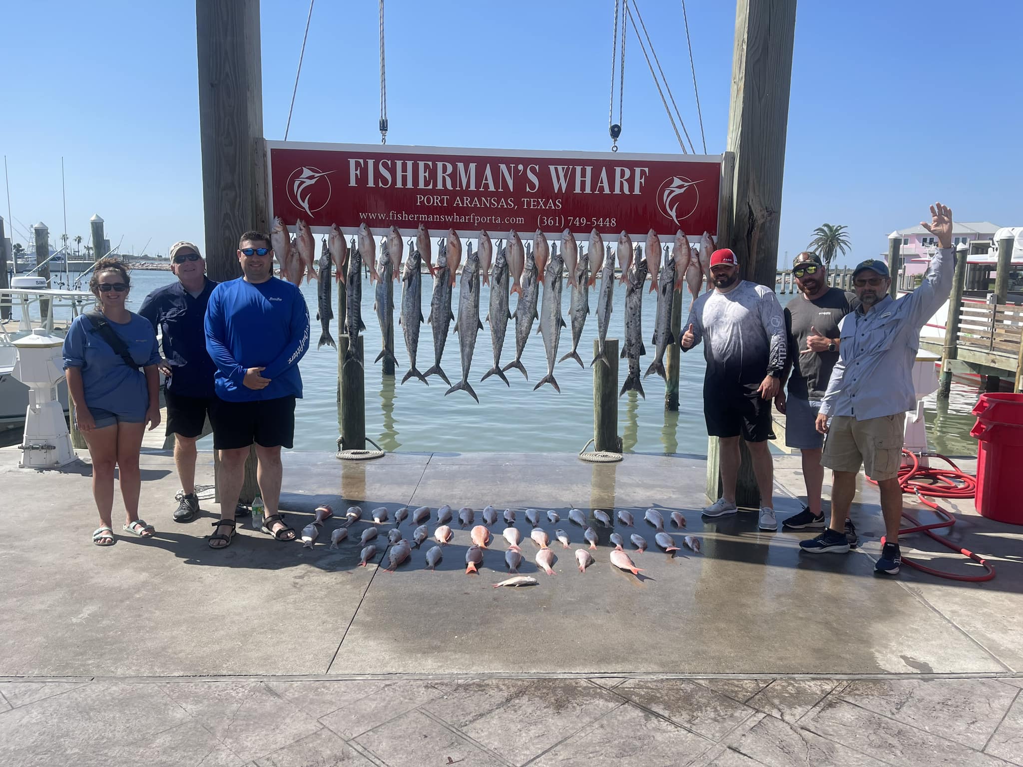 Group of 6 people fishing in TX
