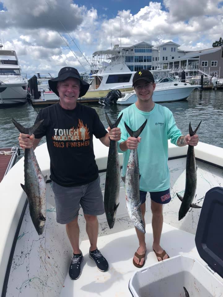 Three 18-inch fish caught by two people at Wrightsville Beach while fishing