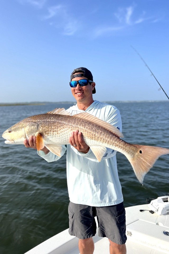 Freshly caught redfish being held on fishing boat in Freeport FL waters