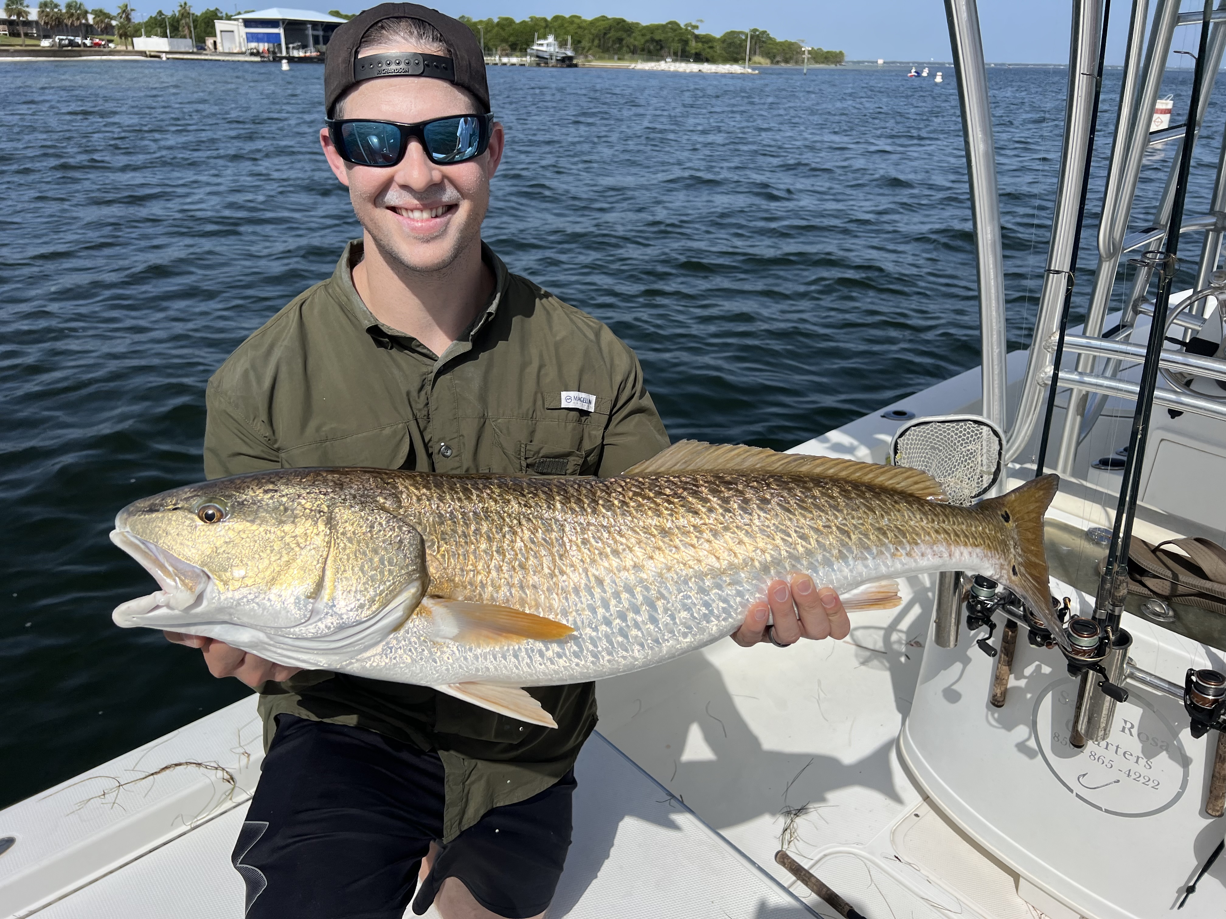 Afternoon inshore fishing trip in Choctawhatchee Bay, Florida targeting redfish and speckled trout