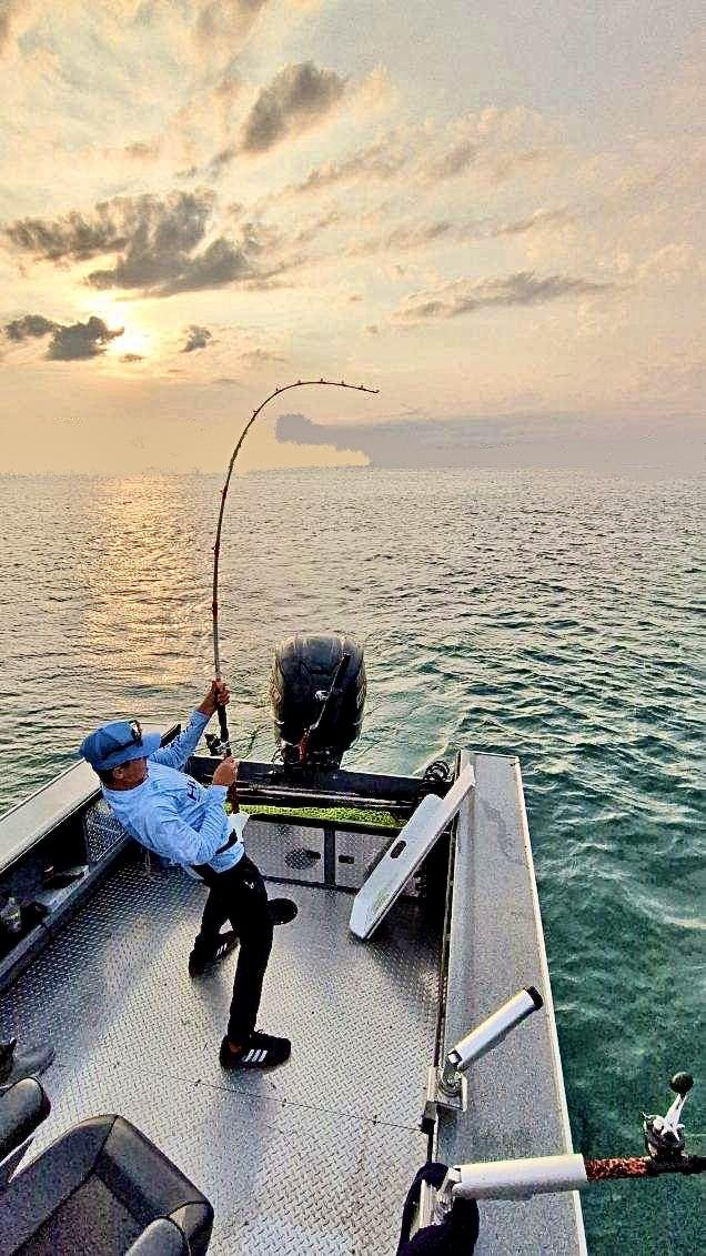 Angler fishing in Clay Township