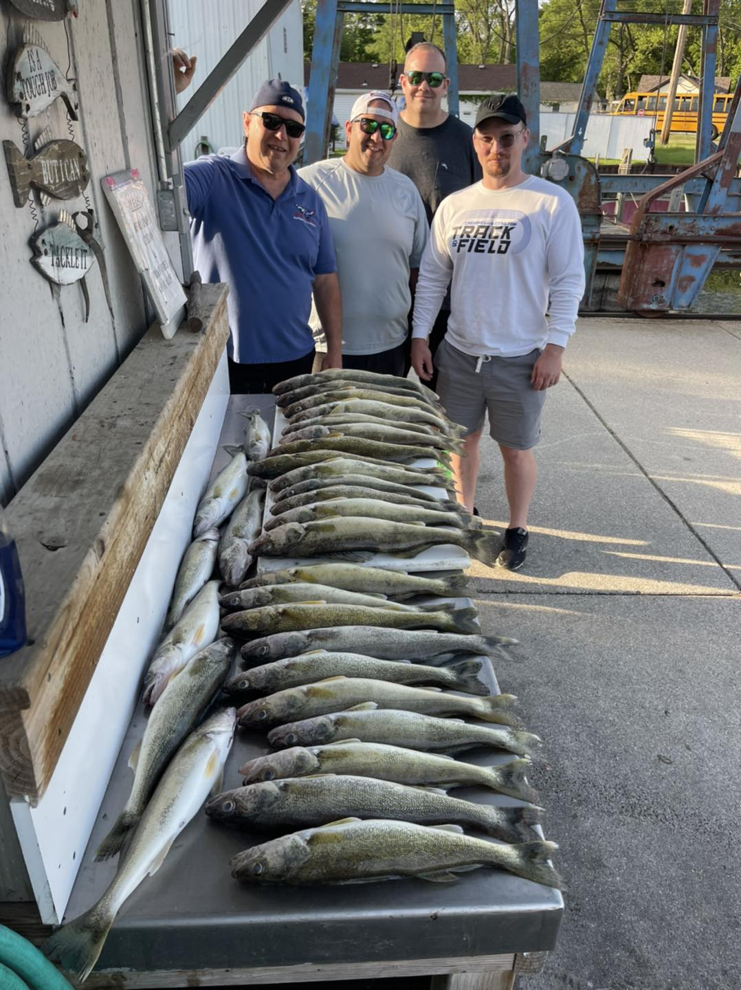 Two fishermen with big fish caught in Clay Township