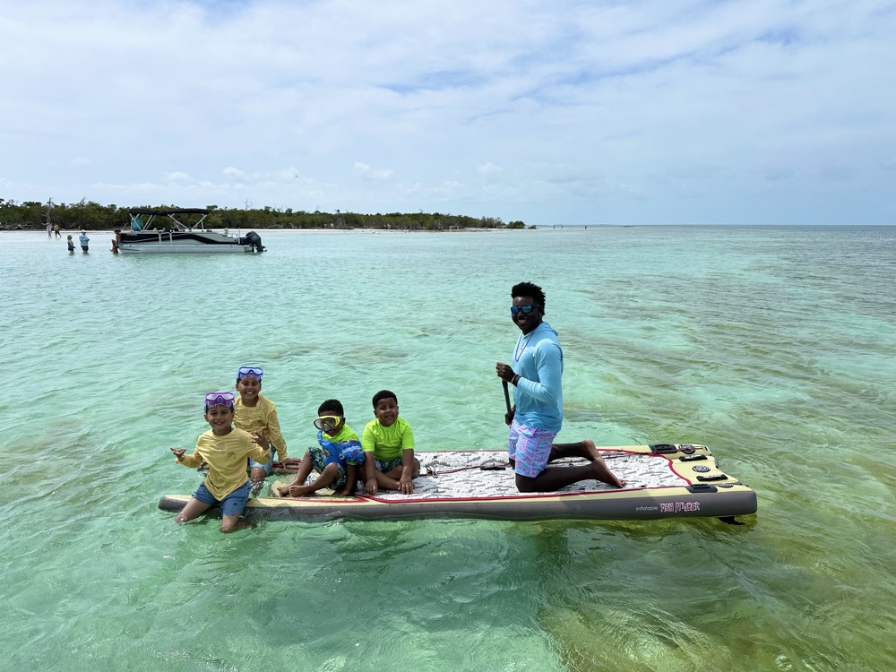 Key West fishing charter boat with family enjoying fishing and snorkeling adventure