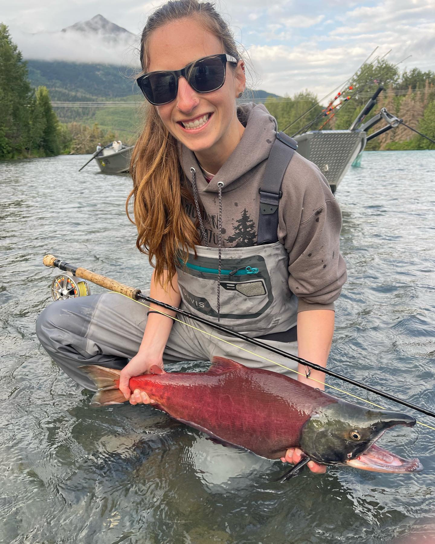 Angler with a 14-inch fish in Cooper Landing