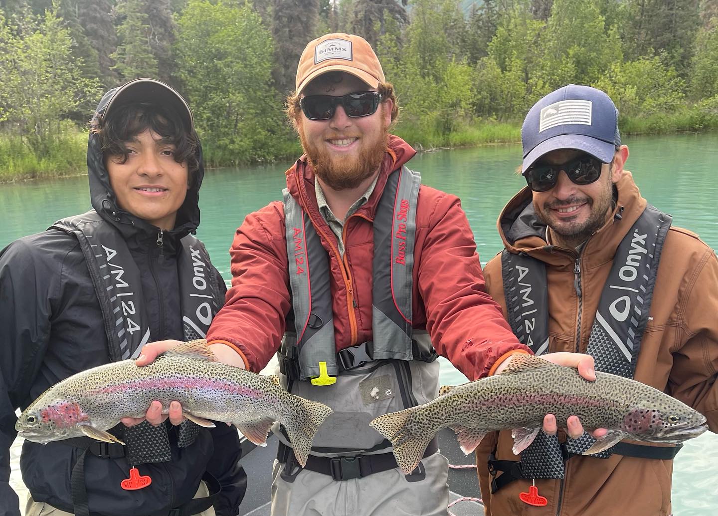 Two rainbow trout fishing in Cooper Landing