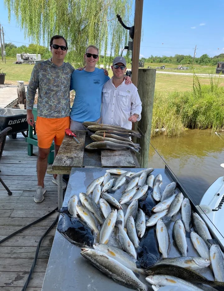 Three people fishing in St Bernard