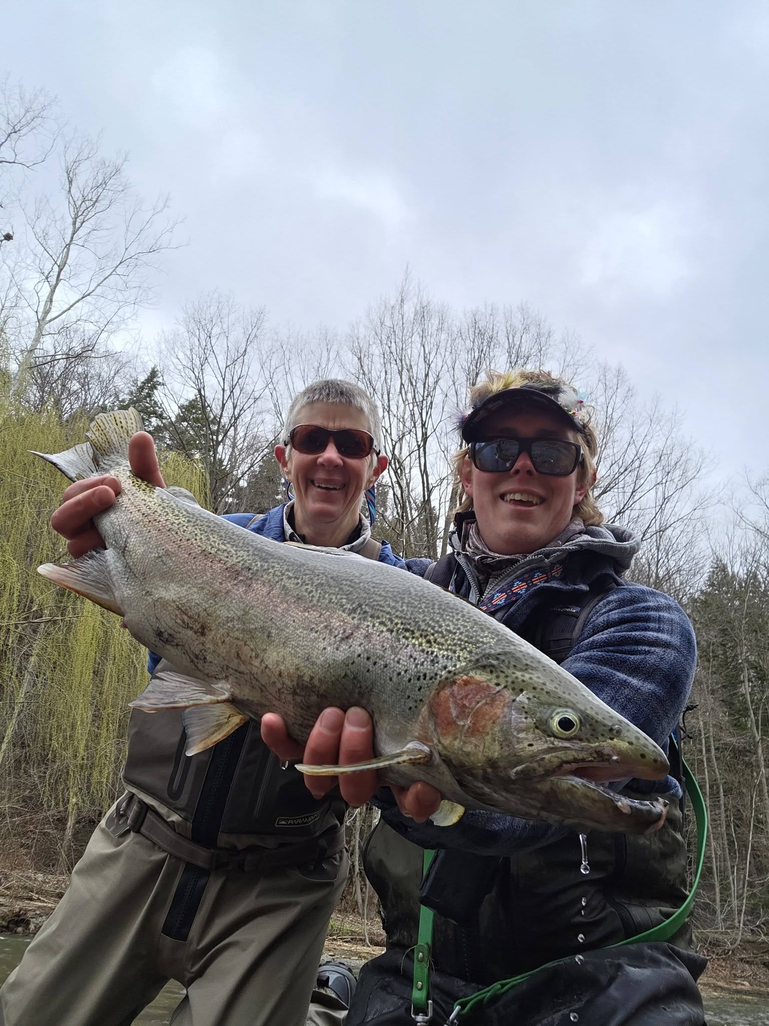 Large salmon catch displayed by two anglers in Angola NY