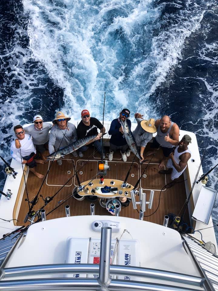 A group of 7 people fishing at Pompano Beach