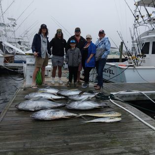 A group of 6 people fishing at Virginia Beach