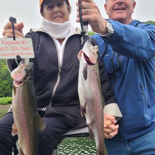 Two rainbow trout fishing in MO