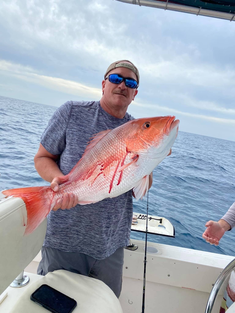 Lone angler fishing in the waters of Port Orange