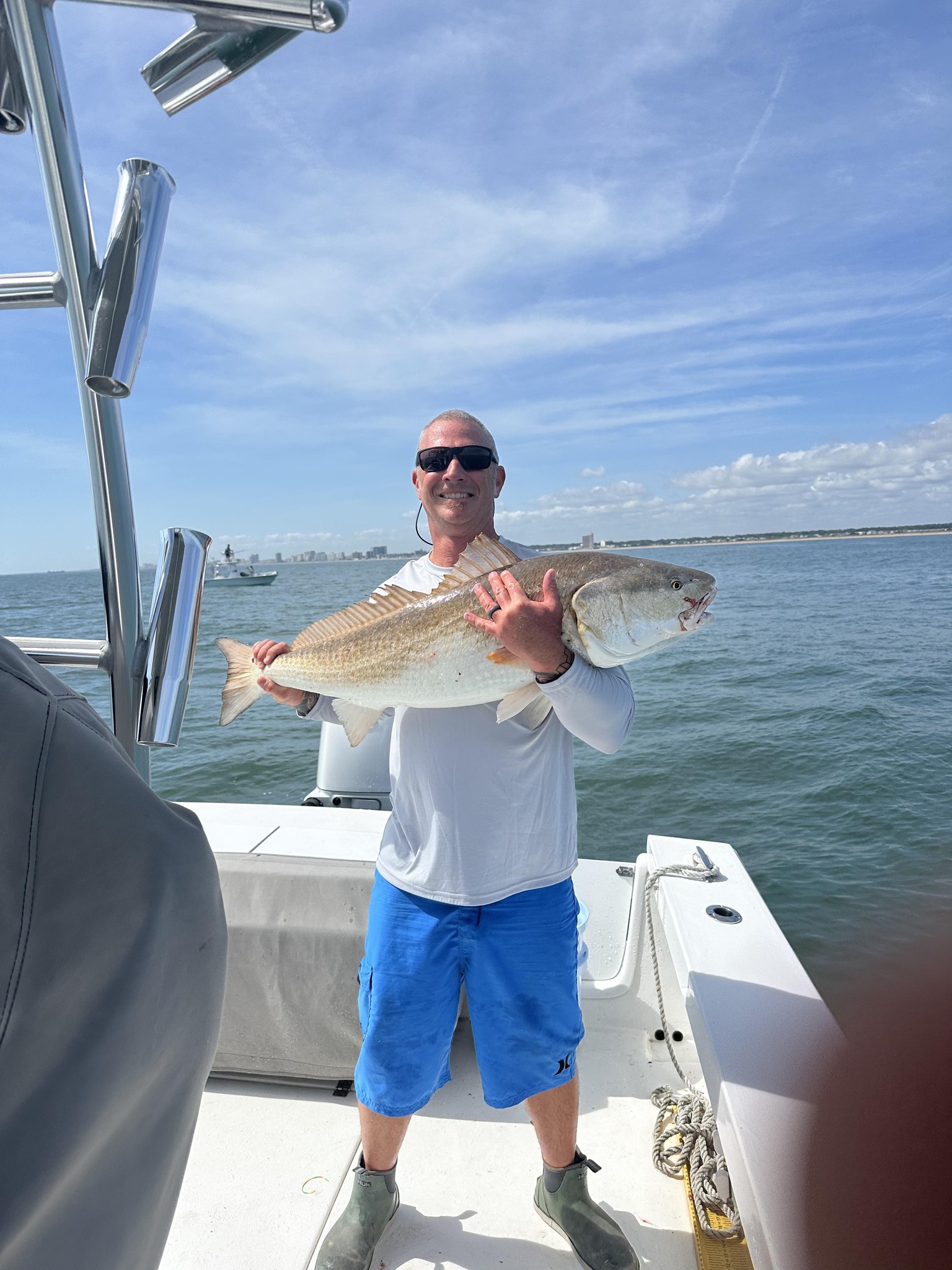 Virginia Beach inshore fishing charter boat targeting puppy drum and speckled trout in calm waters