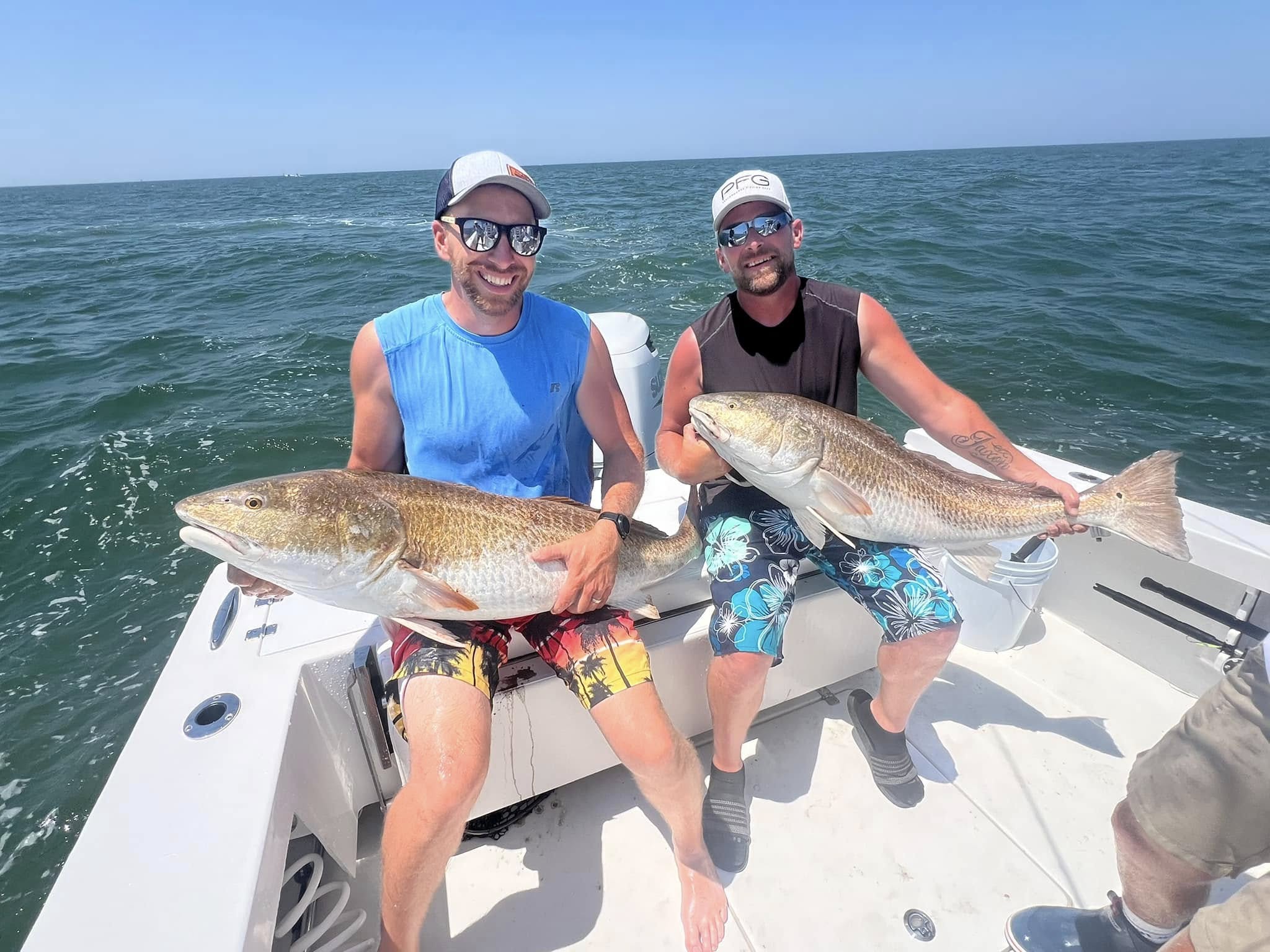 Virginia Beach inshore fishing charter boat on coastal waters with anglers fishing
