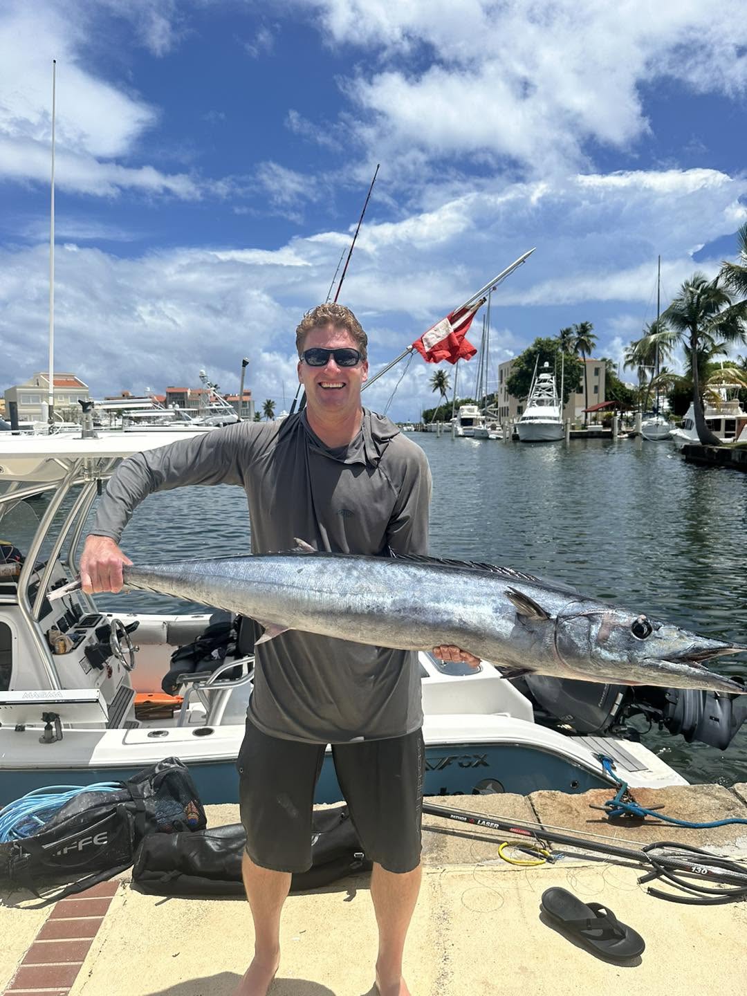 Wahoo fish catch at Palmas del Mar Humacao marina with boats in background