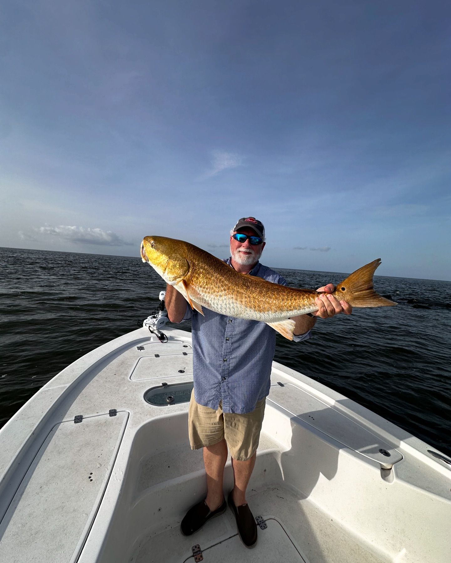 Angler with a 25-inch catch in St Bernard