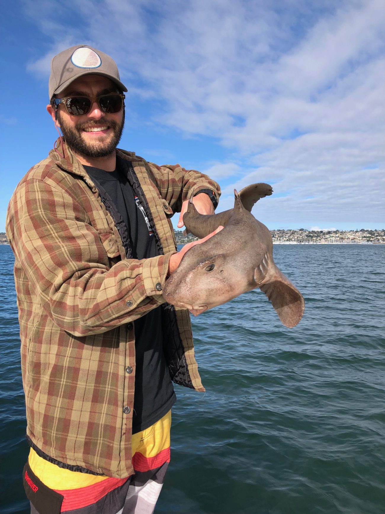 Angler posing with a fish in Coronado