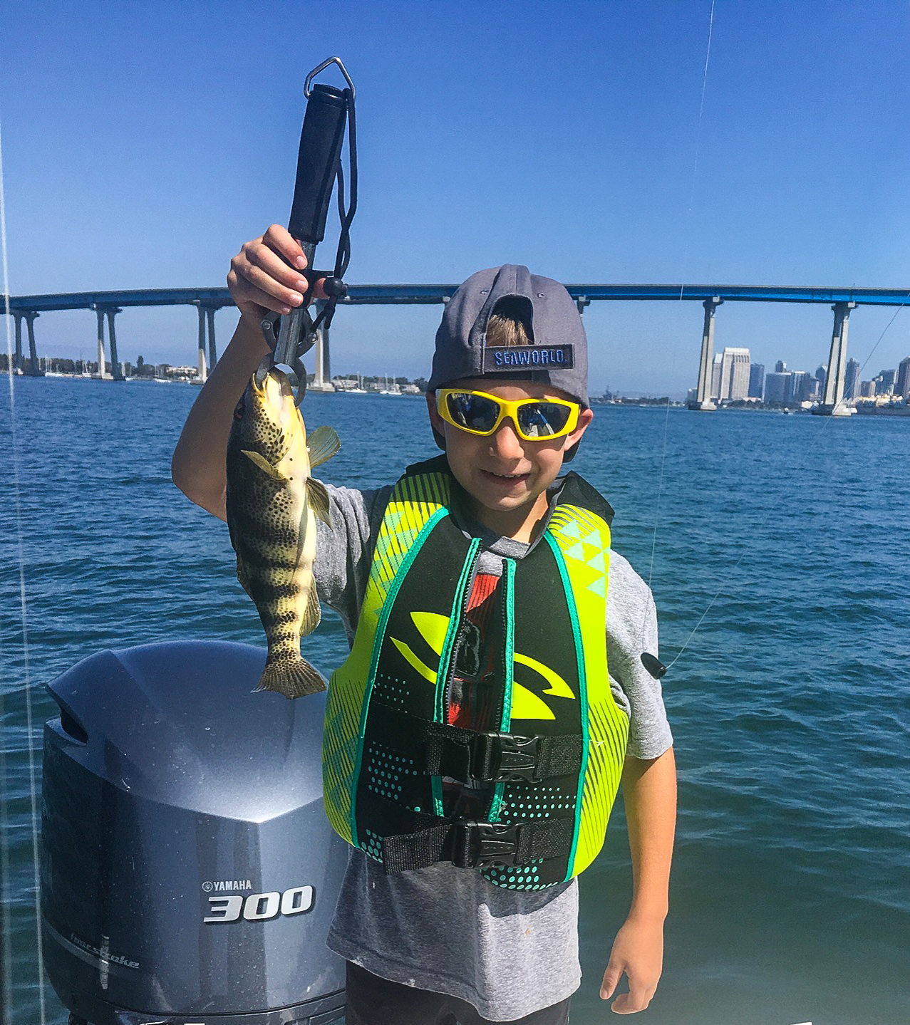 A person fishing on the coast of Coronado