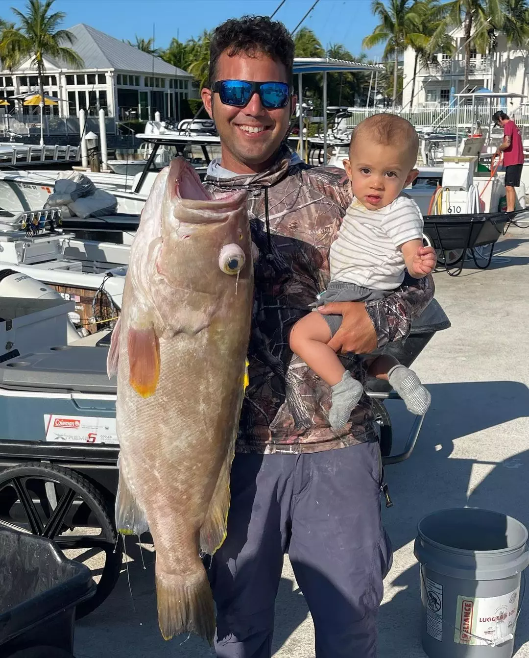Two people fishing on the waters of FL