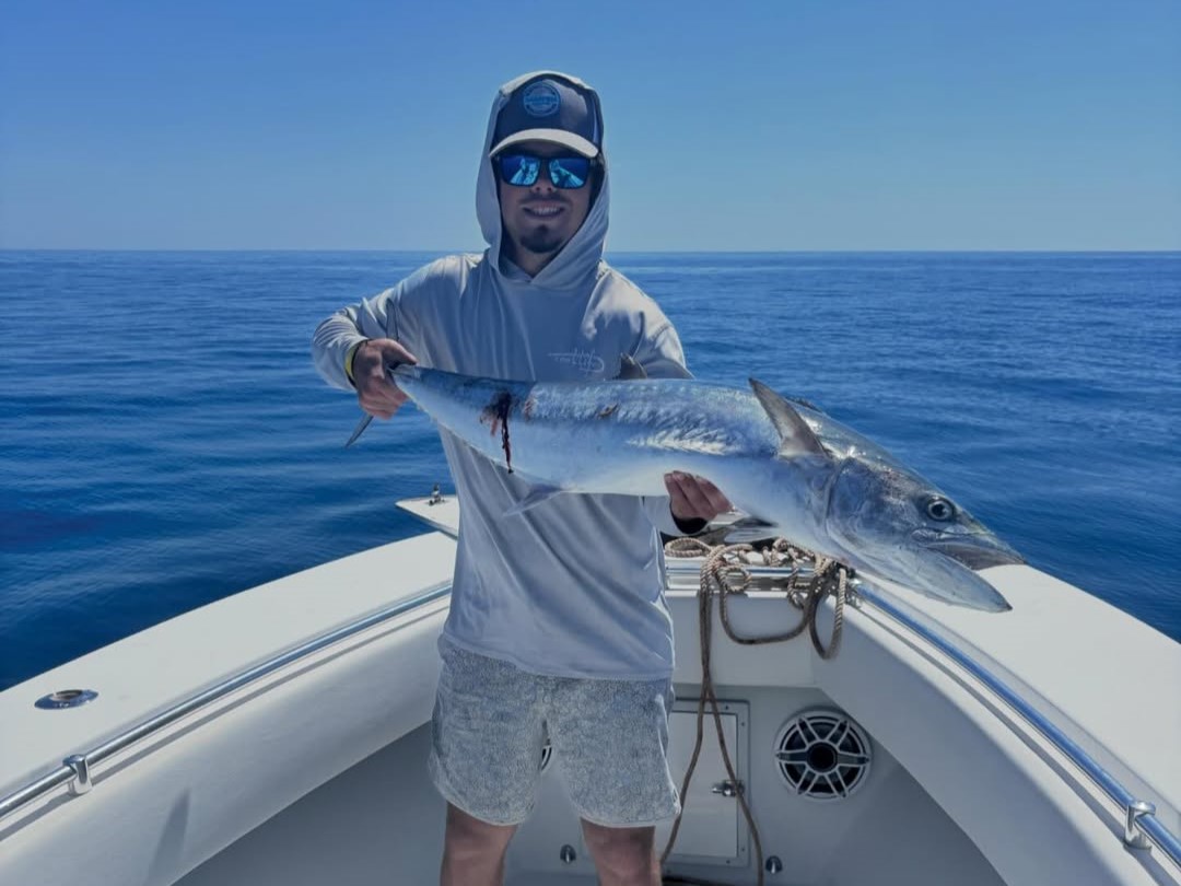 Tampa Bay inshore fishing charter boat with captain targeting snook, redfish, and trout