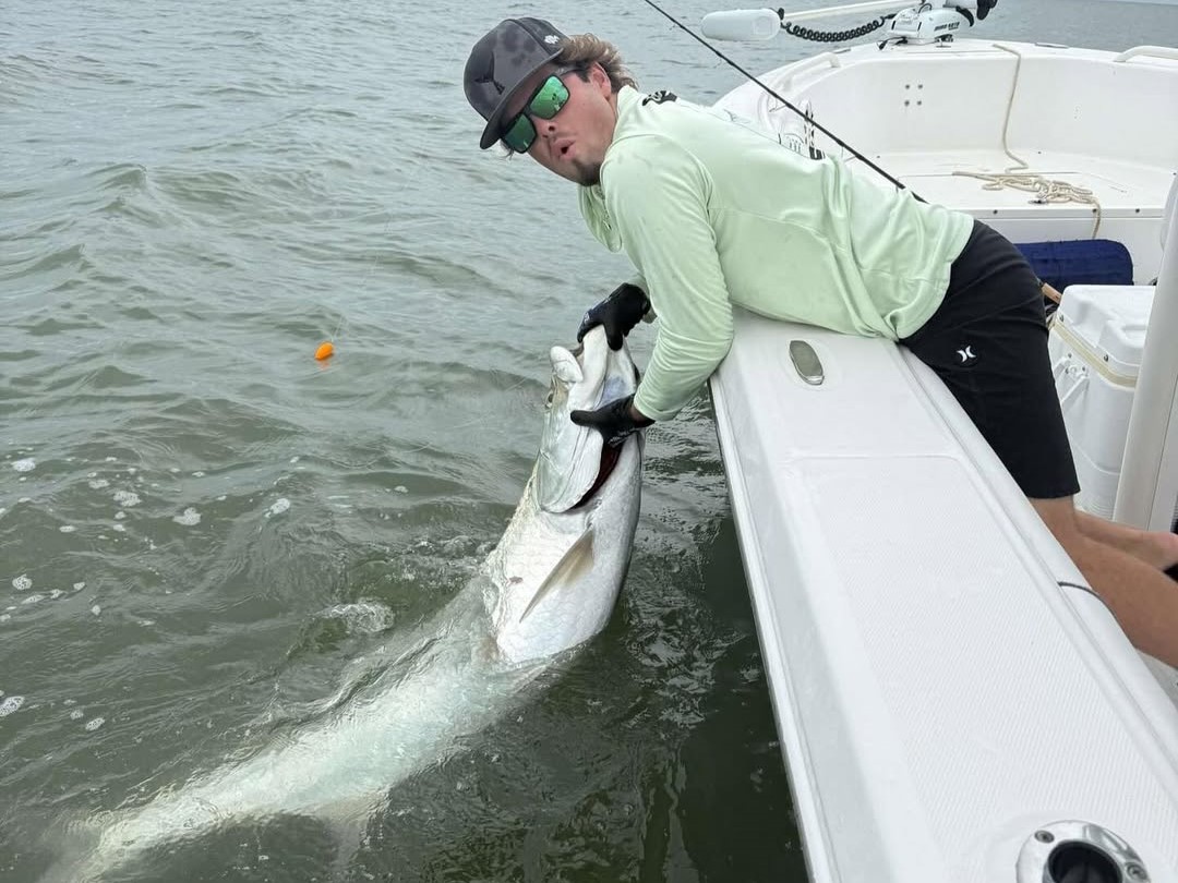Tampa Bay tarpon fishing charter boat with Captain Bryce targeting silver king fish inshore