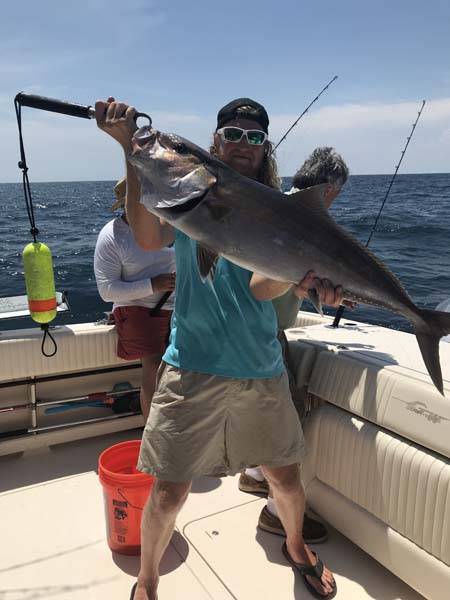 Successful angler fishing in FL