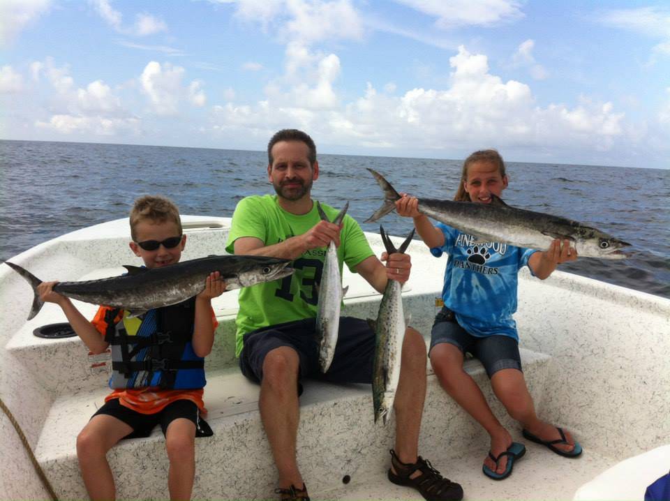A group of 4 king mackerel fish caught in Orange Beach