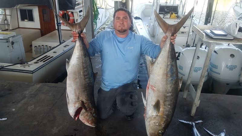 Two anglers fishing with rod and reel in Texas