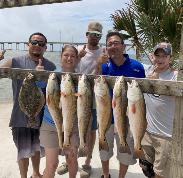 6 Summer Flounder and Redfish caught in Rockport