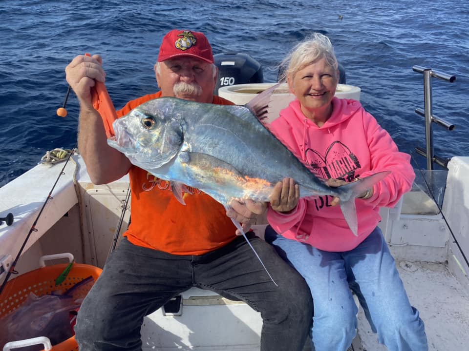 Angler with large African Pompano fish caught at Bradenton Beach