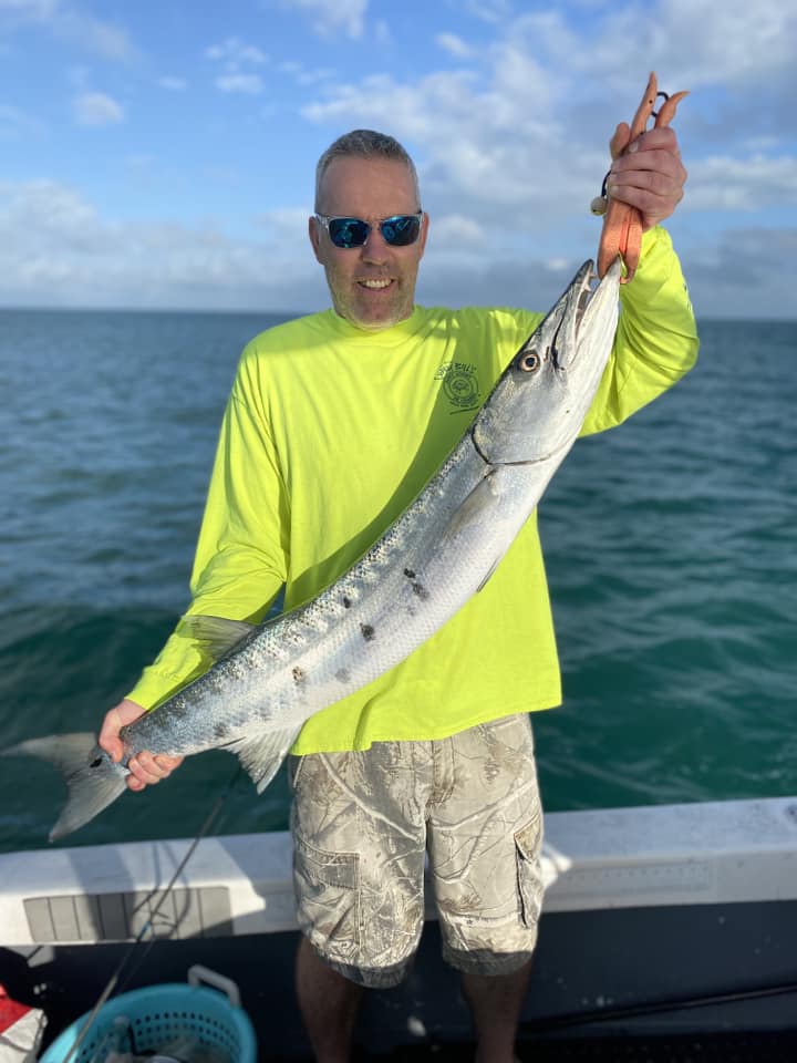 Photograph of a large great barracuda fish being caught during a fishing tour in FL