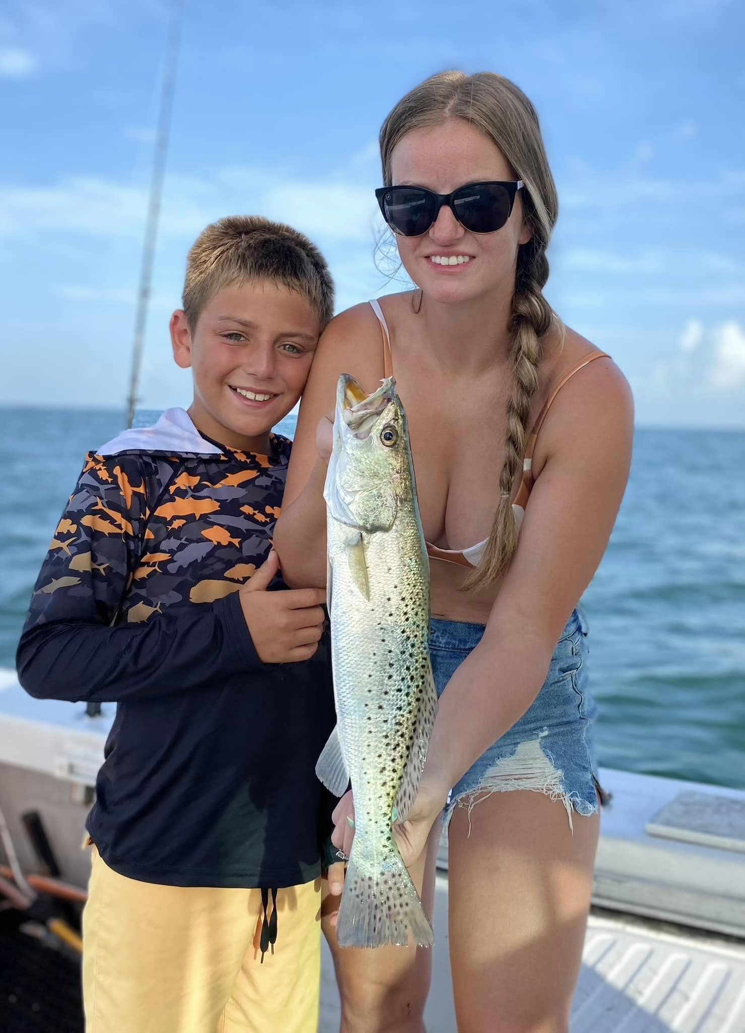 A spotted weakfish caught by two people fishing in FL